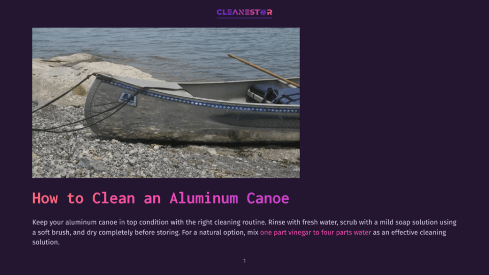 1 How To Clean An Aluminum Canoe A Close-Up Of An Aluminum Canoe Resting On A Rocky Shore Next To Calm Water, With A Wooden Paddle Inside. The Canoe Has A Blue Stripe Along Its Side.