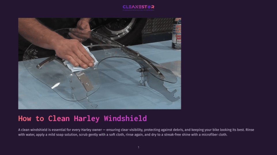 1 How To Clean Harley Windshield A Person'S Hand With A White Cloth, Cleaning A Clear Harley Windshield. A Can Of Cleaning Solution Sits On The Table Behind The Windshield.
