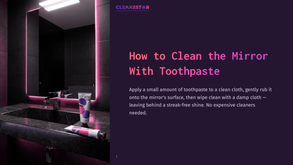 1 How To Clean The Mirror With Toothpaste A Modern Bathroom With A Dark Granite Sink, A Mirror Illuminated By Pink Lights, And A Tube Of Toothpaste On The Counter.