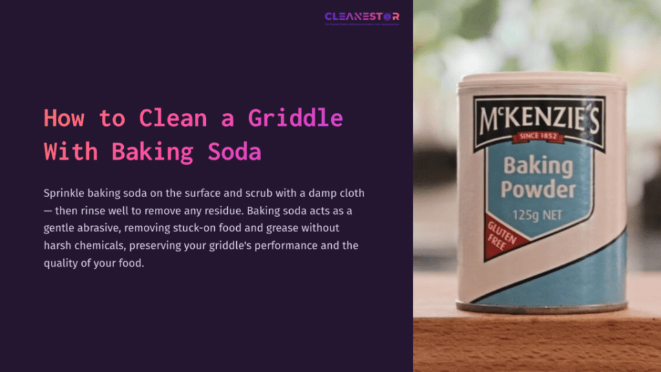 1 How To Clean A Griddle With Baking Soda A White Canister Of Baking Powder With A Blue Label Sits On A Table, Surrounded By A Blurred Green Background.