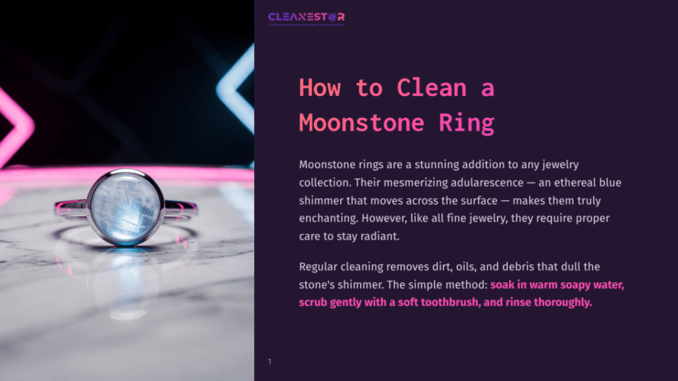 1 How To Clean A Moonstone Ring Close-Up Of A Stunning Moonstone Ring With A Prominent, Ethereal Blue Shimmer, Resting On A Marble Surface. The Ring Is Set In Silver, Showcasing The Captivating Adularescence Of The Gemstone, Perfect For Cleaning And Care.