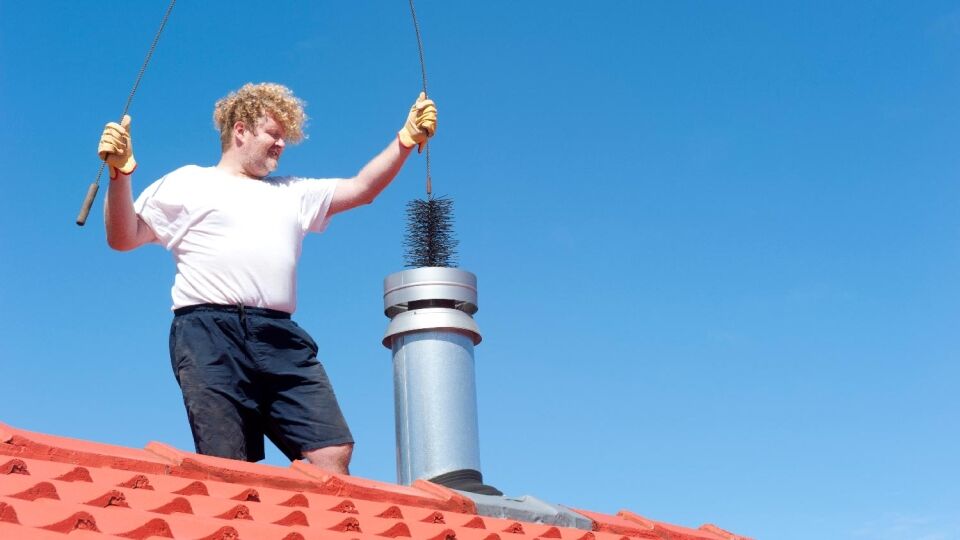 Person Cleaning Metal Chimney 49160514 Do Metal Chimney Flues Need Cleaning