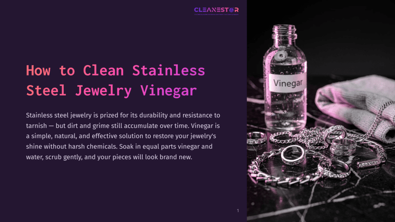 1 How To Clean Stainless Steel Jewelry Vinegar A Bottle Of Vinegar Sits Next To A Pile Of Shiny Stainless Steel Jewelry, Including Rings And Necklaces, On A Dark Marble Surface. A Grey Cloth Is Draped In The Background.