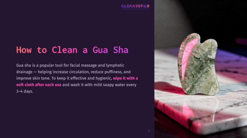 1 How To Clean A Gua Sha A Green Jade Gua Sha Tool, Shaped Like A Leaf, Rests On A Pink Marble Surface, With A Small Splash Of Water Nearby, Ready For Facial Massage And Lymphatic Drainage.